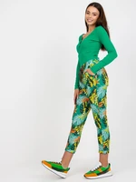 Green patterned sweatpants with pockets