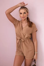 Short jumpsuit with a tie at the waist Camel