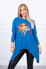 Oversize blouse with rainbow printed jeans