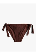 Koton Textured Bikini Bottoms with Binding Detail at the Sides.