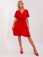 Red lady's dress with tie belt