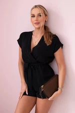 Short black jumpsuit with a tie at the waist