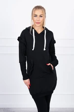 Black dress with decorative ruffles and hood