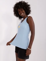 Light blue fitted top with patch