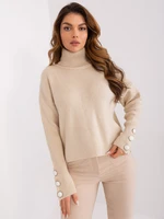 Light beige knitted turtleneck sweater