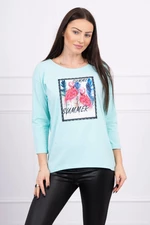 Blouse with 3D mint graphics of flamingos