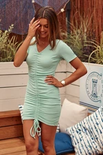 Fitted mint dress with ruffles