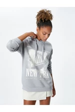 Koton Hooded Sweatshirt with a slogan printed, comfortable fit with long sleeves.