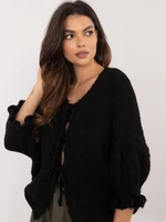 Black oversize sweater with tie in the front