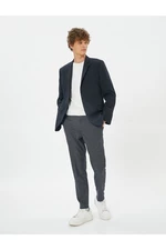 Koton Patterned Woven Trousers with Pockets and Buttons.