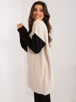 Beige and black cardigan with a neckline