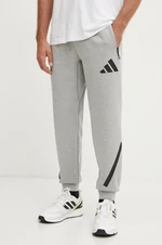 Tepláky adidas ZNE šedá barva, melanžové, JF2446