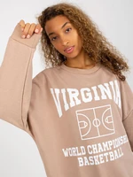 Loose beige sweatshirt with a print and a round neckline