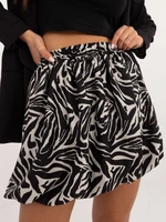 Ecru mini skirt with black zebra print