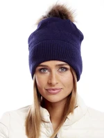 Dark blue hat with fur pompom