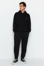 Trendyol Black Men's Oversized Hooded Rubber Legs with Embroidery Pipe, Soft Pillow and Cotton Tracksuit Set.