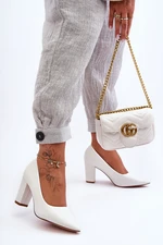 Classic pumps on the white Odessa pillar