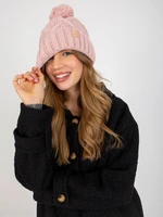 Light pink lady's winter beanie with pompom