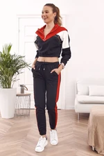 Comfortable sweatshirt with a stand-up collar and red and black trousers