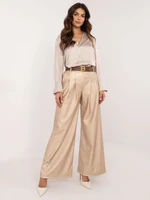 Beige wide trousers made of eco-leather with pleats