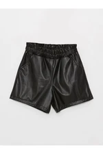 LC Waikiki Girl's Leather-Look Shorts with Elastic Waist.