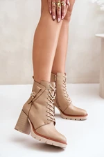 Insulated ankle boots with heels with gold details beige Ivarisse