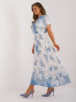 Blue and white dress with oriental patterns