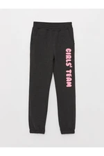 LC Waikiki Girl's Jogger Sweatpants with an Elastic Printed Waist.