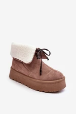 Beige snow boots on the Olimuka platform with sheepskin