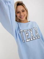 Light blue oversize long sweatshirt with slogan