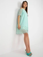 Mint cocktail dress with exposed shoulders