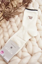 White women's patterned socks with an inscription and a teddy bear