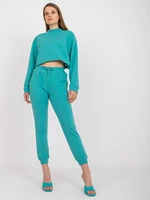 Basic dusty green sweatpants with tie detail