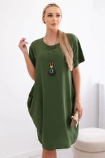 Women's dress with pockets and pendant - light green color