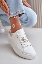 Low sneakers made of eco-leather with badges - white and silver Cillione