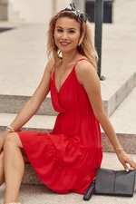 Delicate dress with red clutch neckline