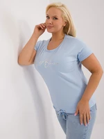 Light blue women's oversized blouse with cuffs