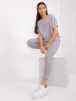 Grey two-piece tracksuit with patch