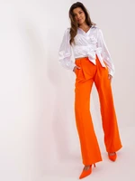 Orange suit trousers with pockets