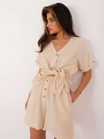 Light beige summer women's ensemble with a button-up blouse