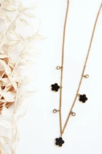 Women's gold chain with black flowers