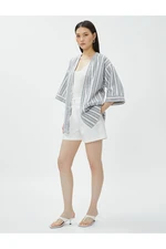 Lniane kimono oversize Koton z kieszeniami i krótkim rękawem