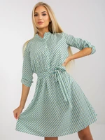 Casual white-green dress with button fastening