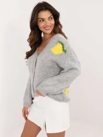 Grey women's patterned sweater with button fastening