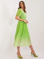 Light green women's polka dot dress with belt