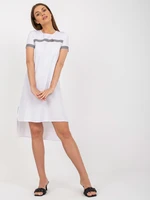 Casual white dress of asymmetrical cut