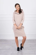 Dress with hood and pockets in beige color