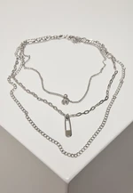 Layered necklace with a silver-colored amulet