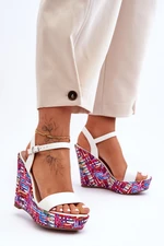 Women's sandals on a white Malibu wedge