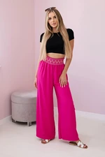 Trousers with a wide elastic waistband in fuchsia